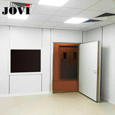 Porta blindada por RF de 85 mm de espessura com isolamento de 100 dB e vedação magnética para salas de ressonância magnética